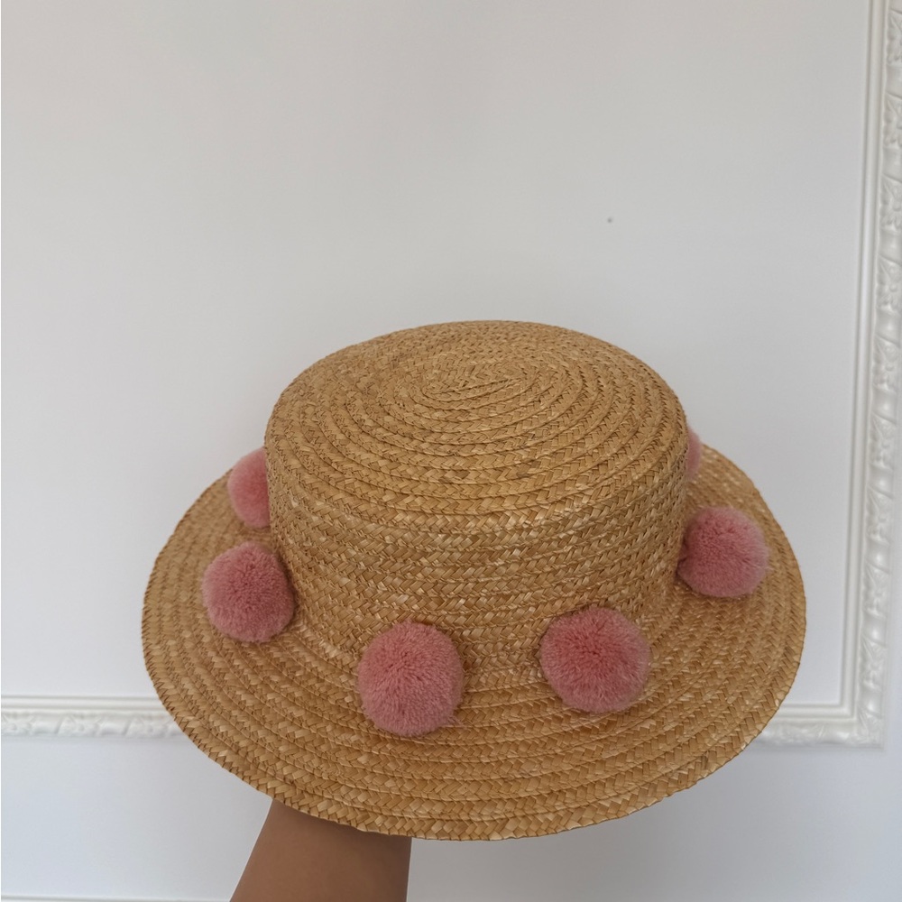 Straw Hat with Pink Pom Poms